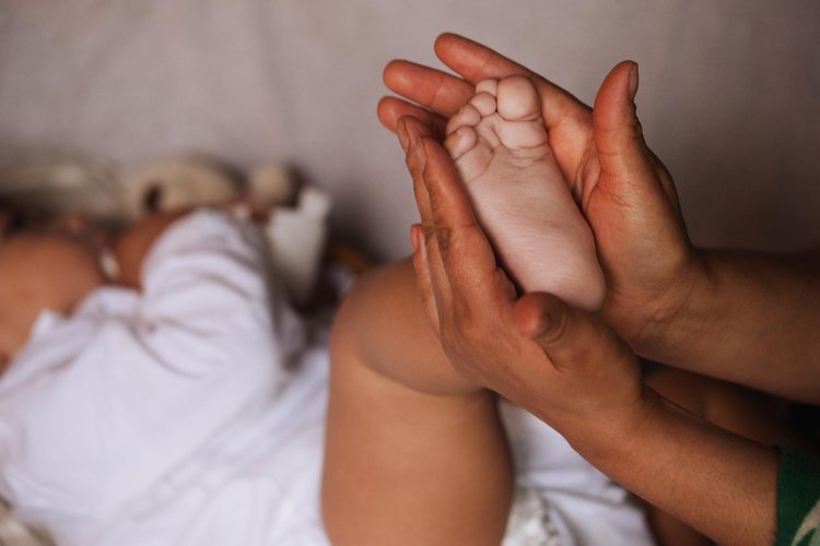 Massage pour bébé à domicile