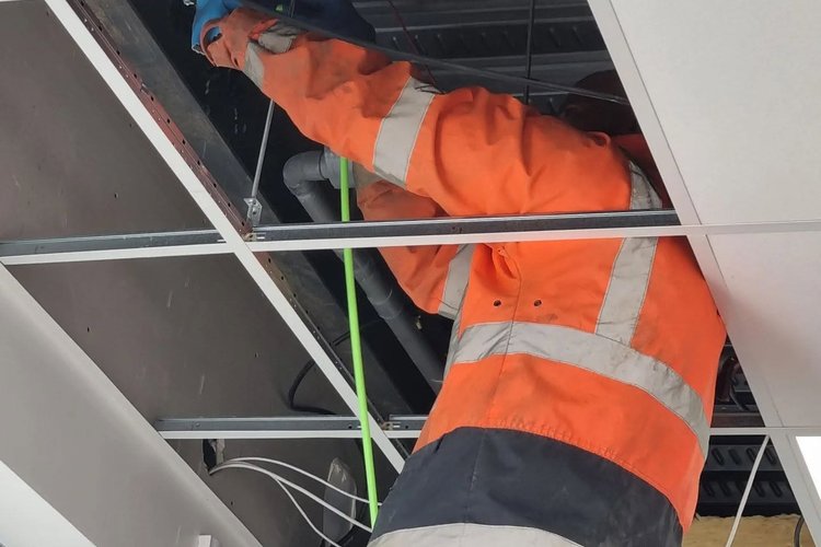 Curage de canalisation en faux plafond