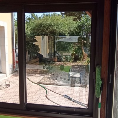 Nettoyage des baies vitrées de véranda
