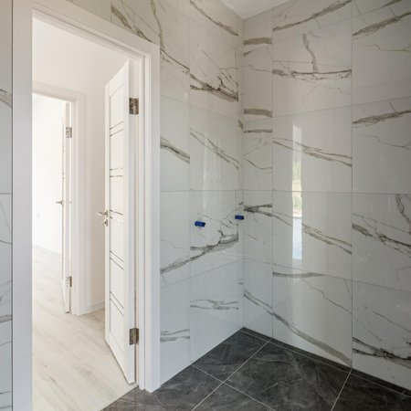 Pose de faïence décorative pour pièces de vie