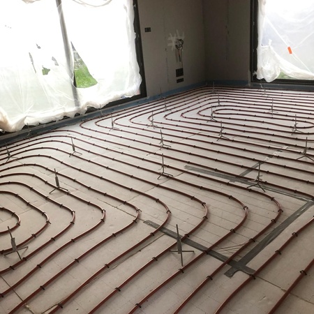 Coulage de chape sur plancher chauffant