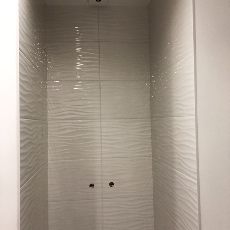 Pose de carrelage mural